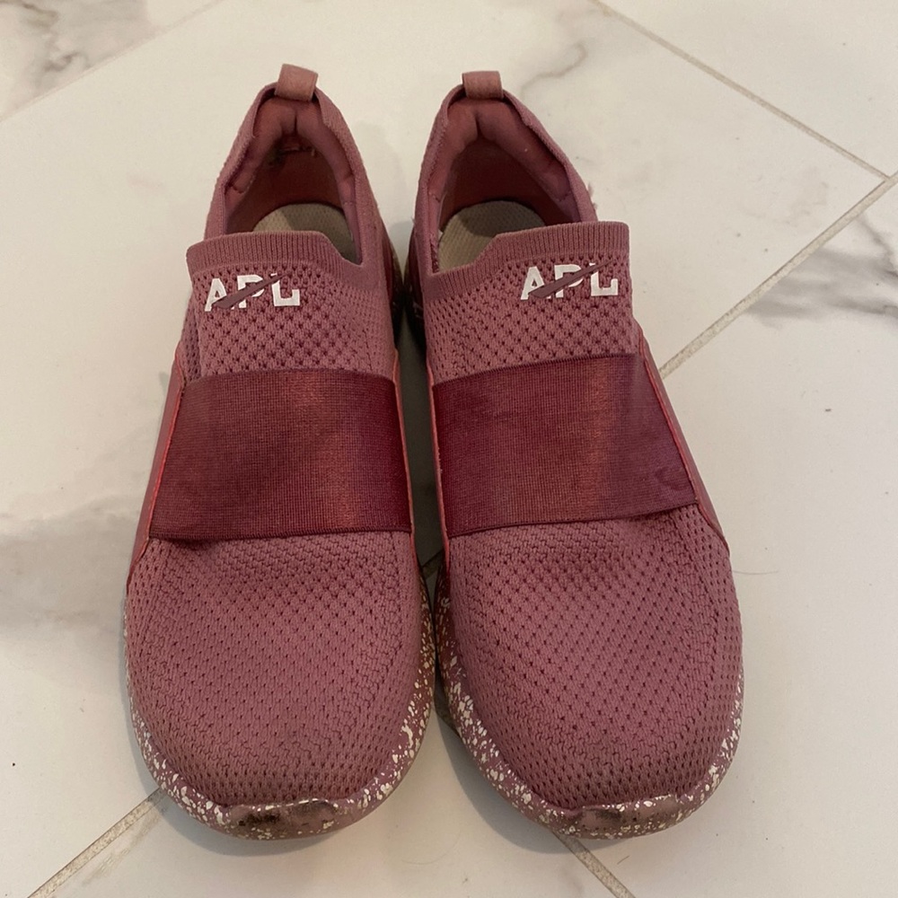 APL tennis shoes. Size 7
